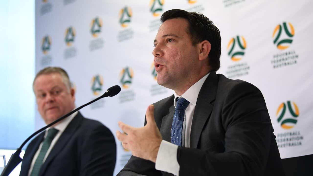 A-League boss Greg O'Rourke and FFA CEO James Johnson address the media