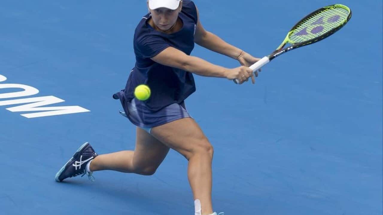 Daria Gavrilova of Australia plays a backhand to Olivia Rogowska.