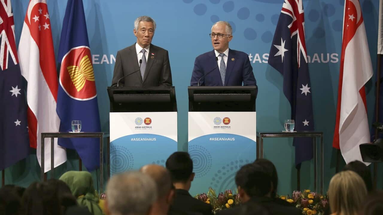 Singapore's PM Lee Hsien Loong, left, and Australia's PM Malcolm Turnbull hold a joint press conference at the end of the ASEAN special summit.