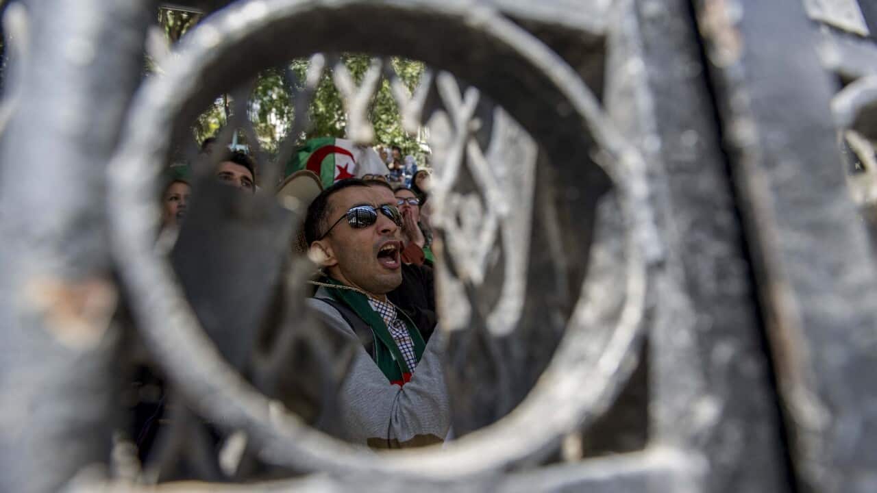 Sit-in of students inside the Algiers Central School with a slogan "Ni Gaid, Ni Said. It's the people who decide".
