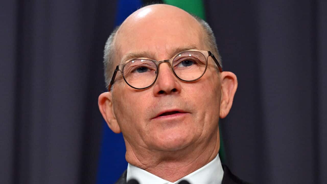 A man wearing glasses