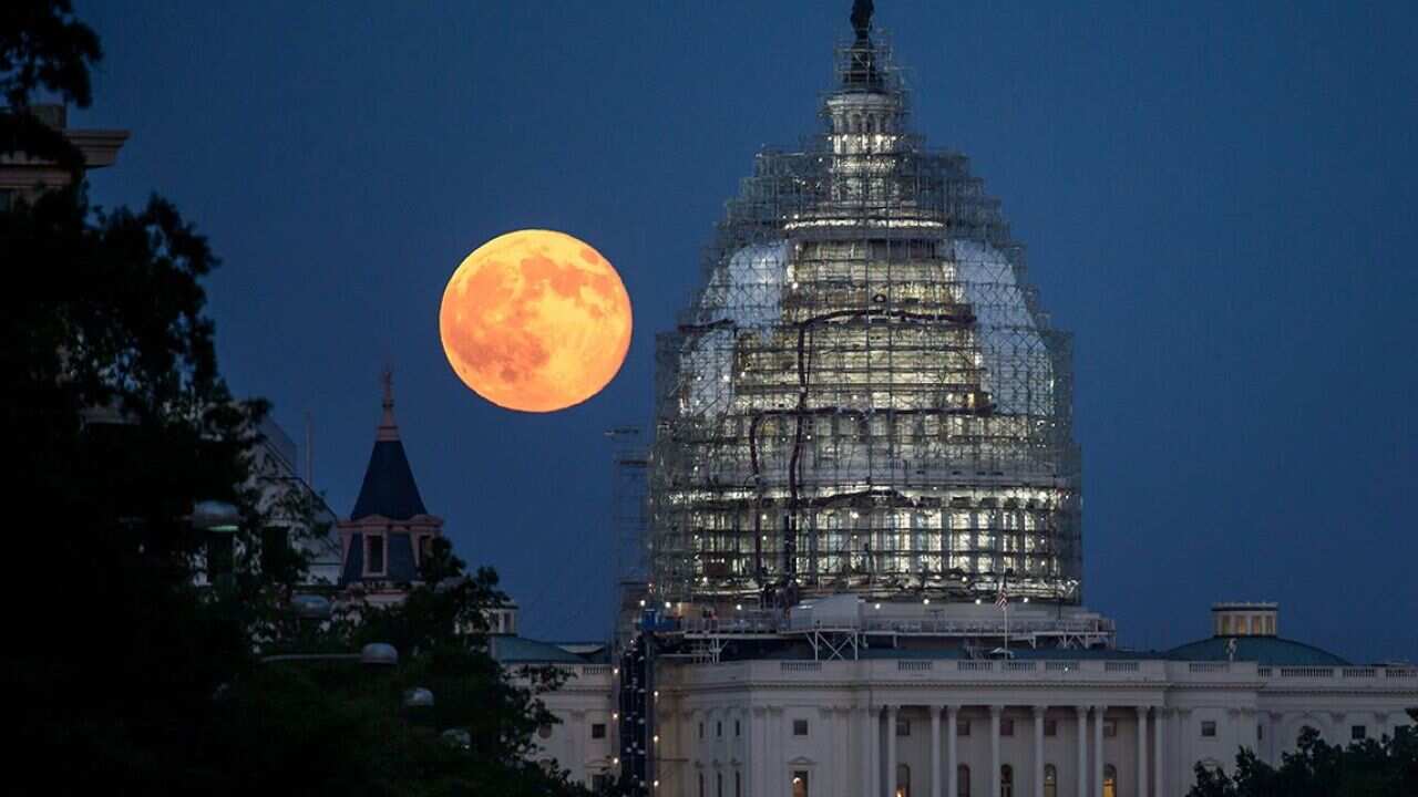 Supermoon is seen as it rises near the Lincoln Memorial on March 19, 2011.