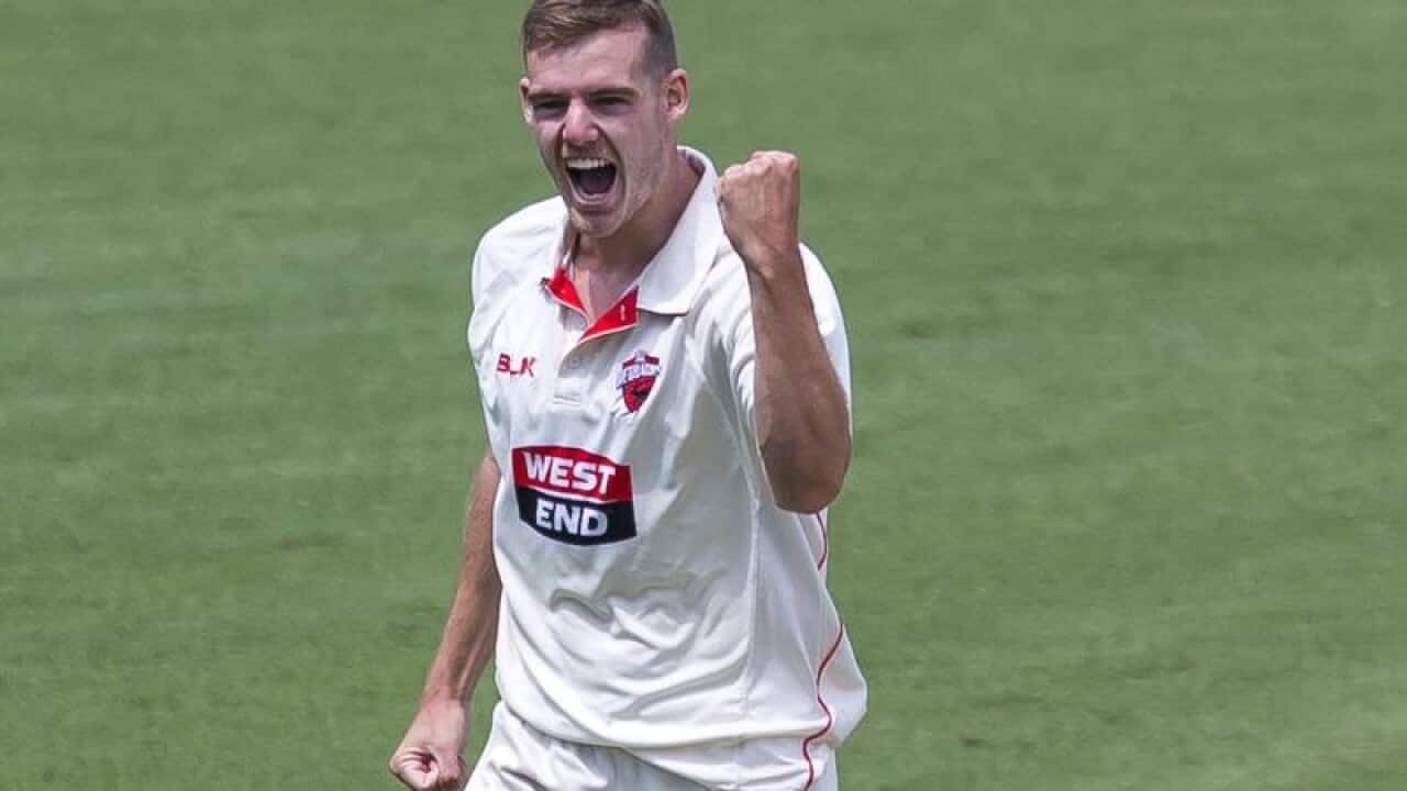 Nick Winter celebrates after taking a wicket at the SCG in Sydney.