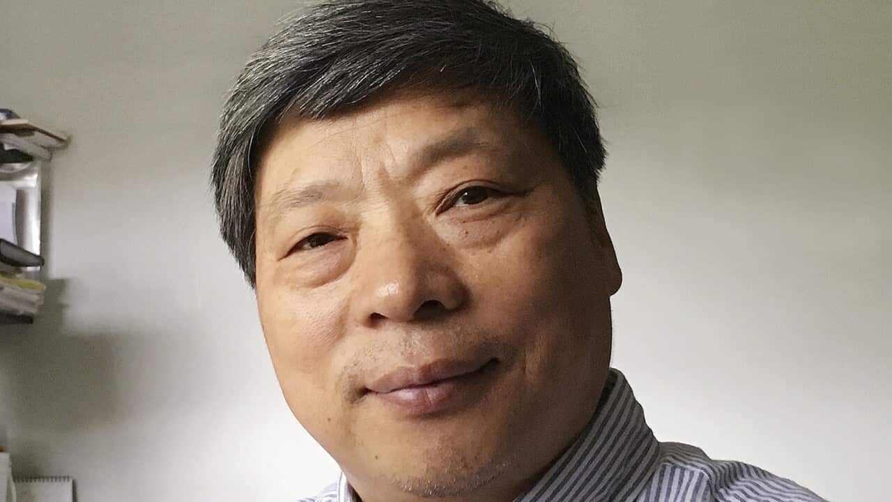 In this photo taken on July 2018 and released by Xu Xiaoli on Wednesday, Nov. 28, 2018, Lu Guang poses for a photo in New York.