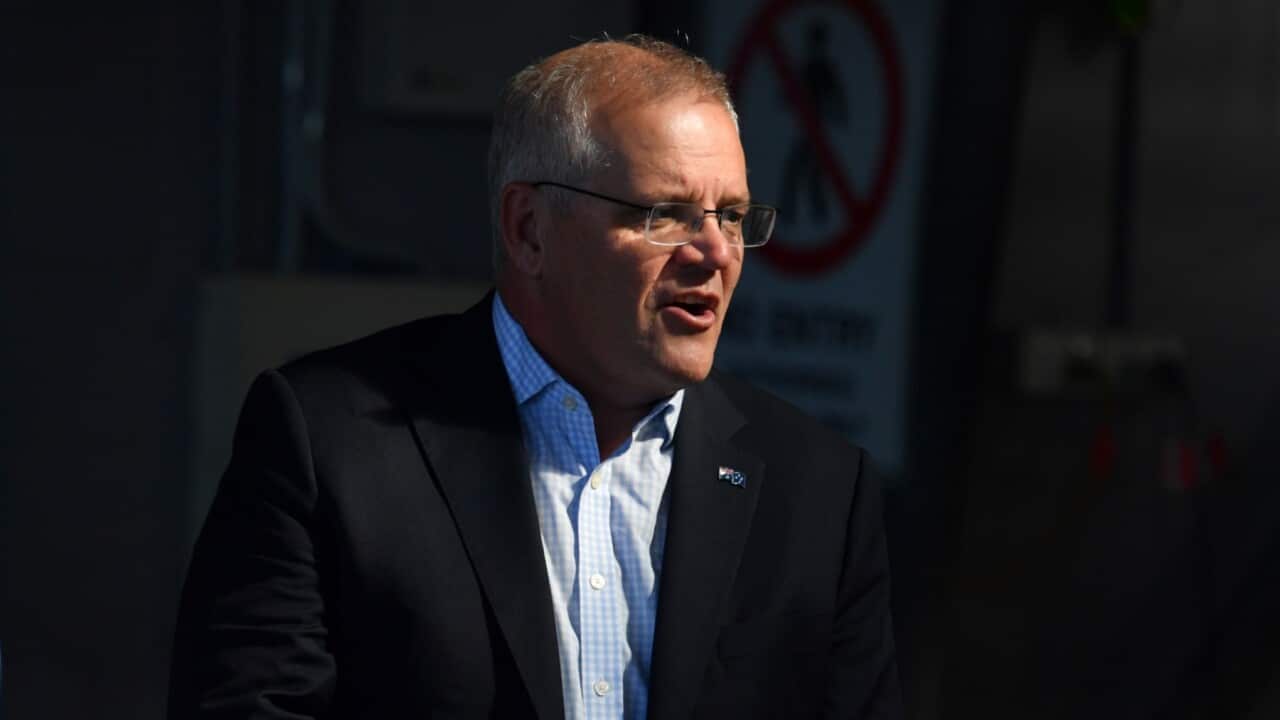 Prime Minister Scott Morrison visits Skytek aviation engineering facility on Day 17 of the 2022 federal election campaign, in Cairns, in the seat of Leichhardt. Wednesday, April 27, 2022. (AAP Image/Mick Tsikas) NO ARCHIVING