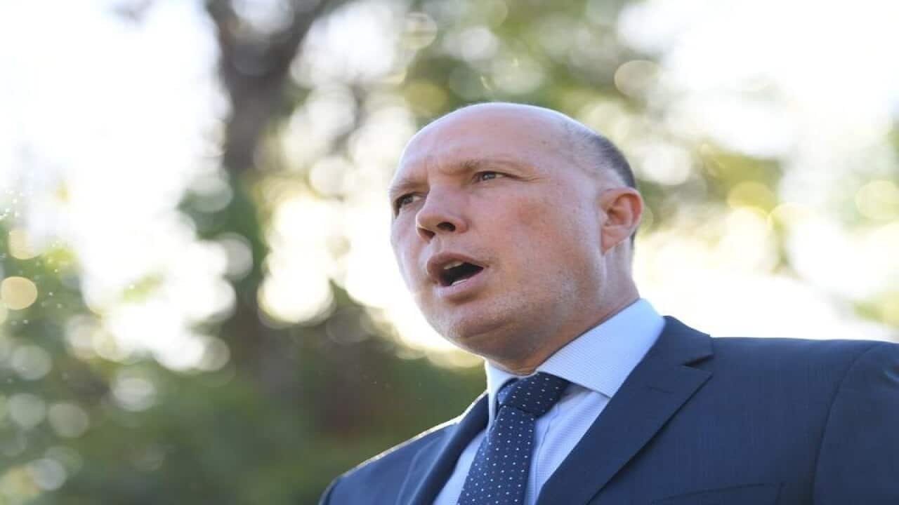Minister Peter Dutton is having a war of words with a senator.
