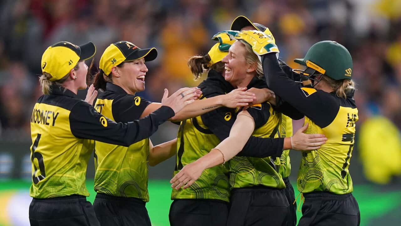 Australian players celebrate during the Women's T20 World Cup final