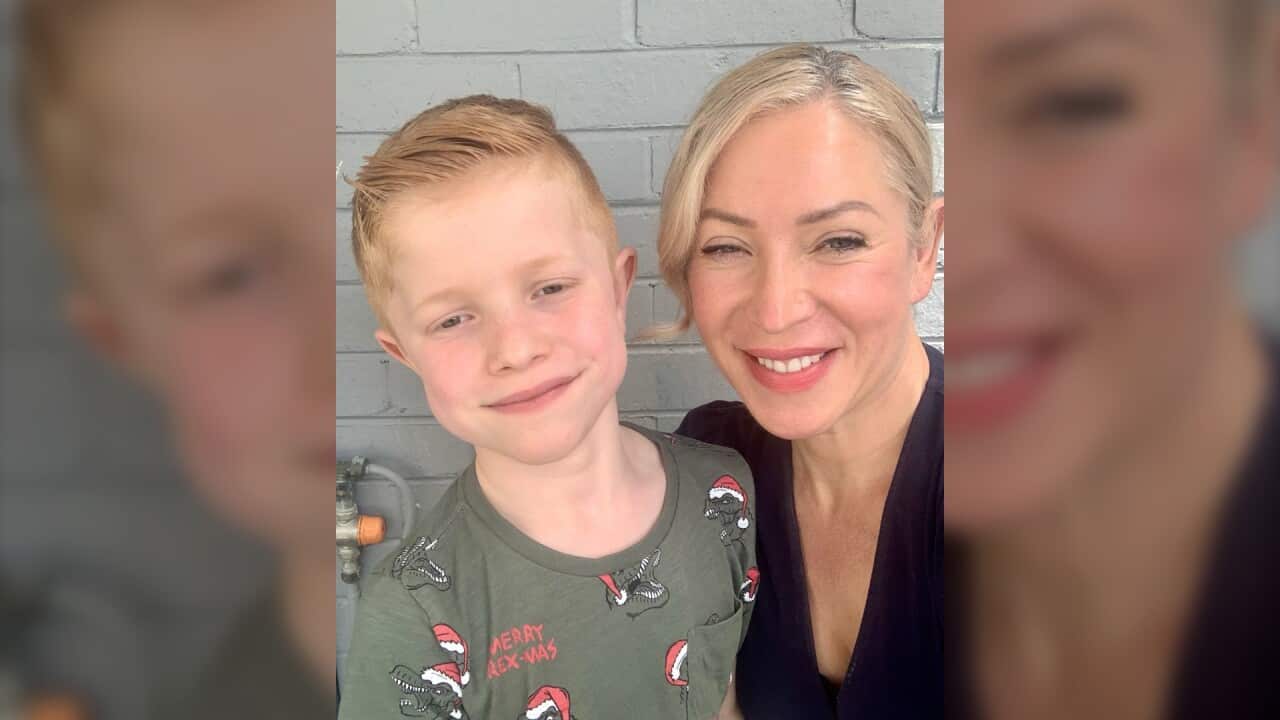 A smiling Etienne Gould-Noonan with his mum Carmen Gould.