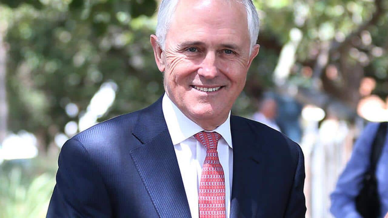 Australian Prime Minister Malcolm Turnbull smiles as he arrives for a visit to Bronte Public School in Sydney, Monday, Nov. 2, 2015. (AAP Image/David Moir) NO ARCHIVING
