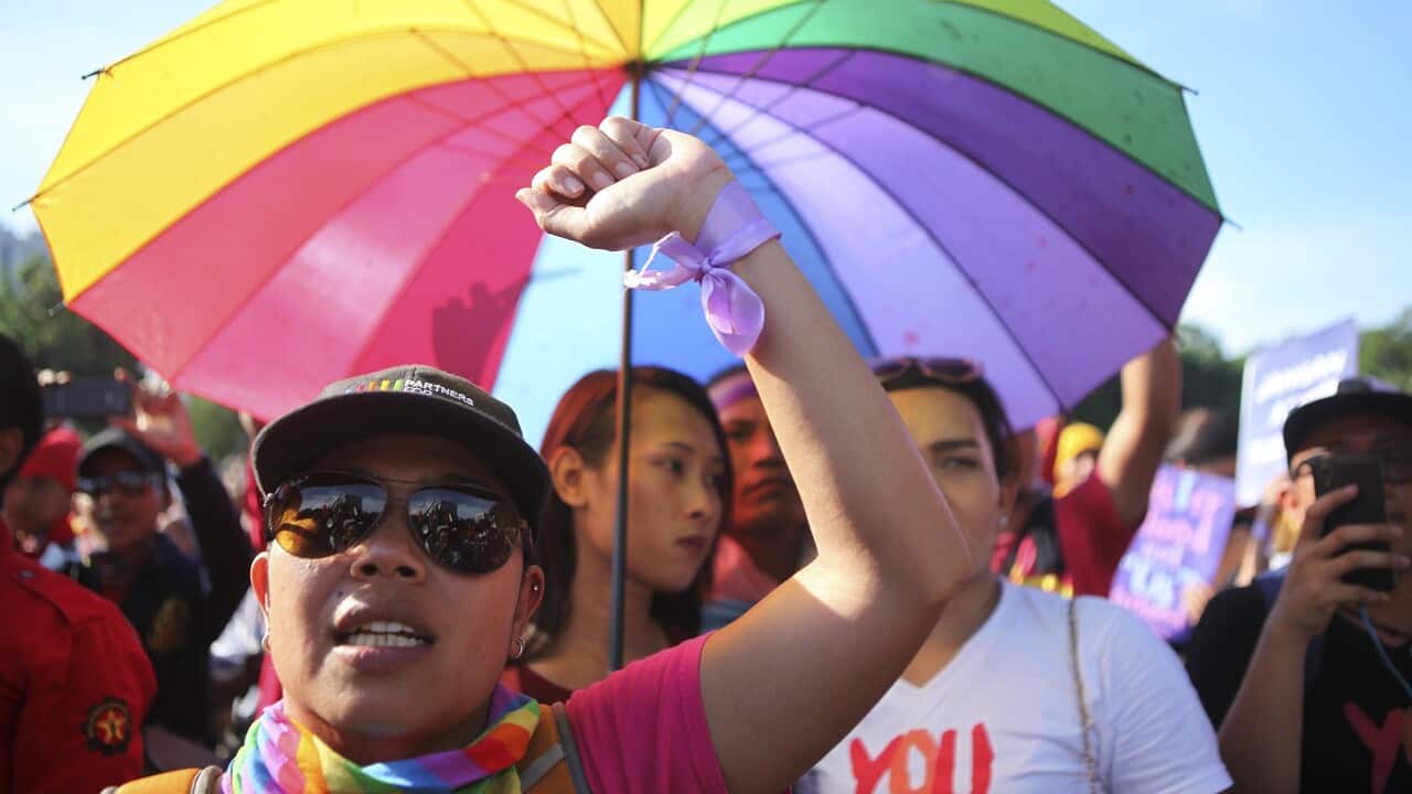 LGBTIQ+ activists hold a rally in Jakarta.