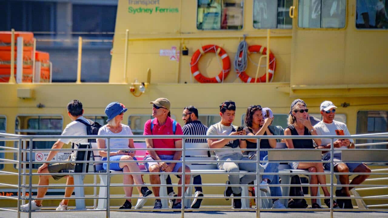 Passengers enjoying a ferry ride in Sydney, Australia.