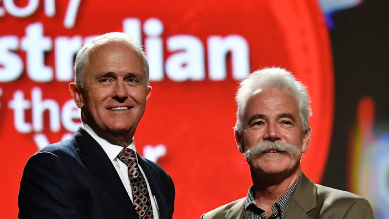 Prime Minister Malcolm Turnbull and 2017 Australian of the Year Emeritus Professor Alan Mackay-Sim at an event at Parliament House in Canberra, Wednesday, Jan. 25, 2017. (AAP Image/Mick Tsikas) NO ARCHIVING