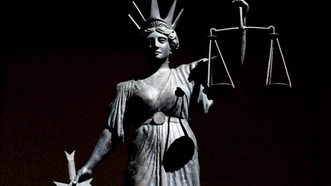 A woman accused of sending her daughters to Somalia to undergo genital mutilation has pleaded not guilty.