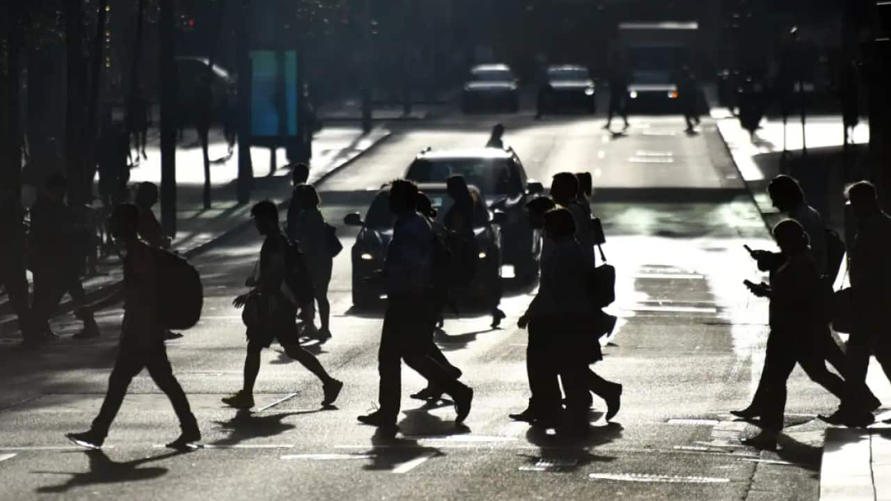 A file photo of office workers in Sydney's CBD.