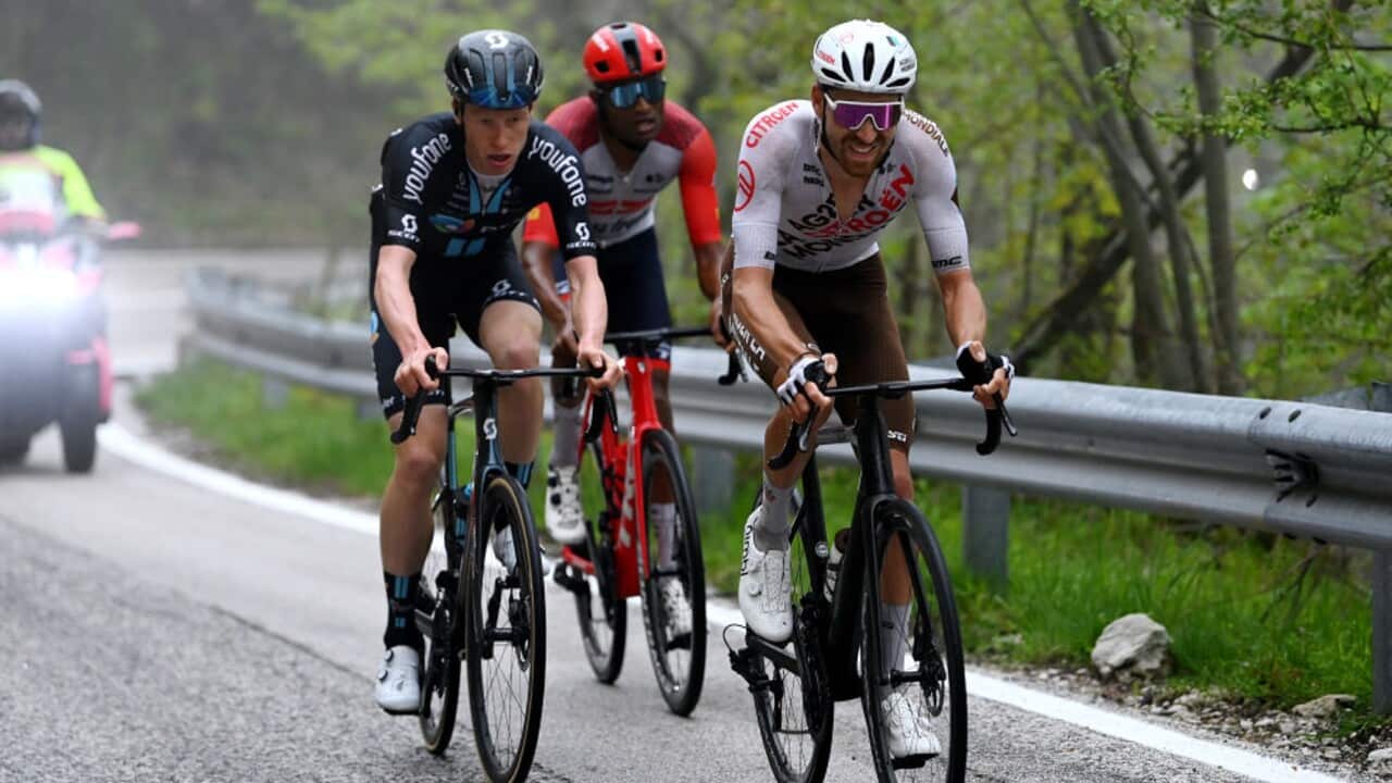 Aurelien Paret-Peintre (R) won Stage 4 of the 2023 Giro d'Italia, but it was Andreas Leknessund (L) who took the maglia rosa
