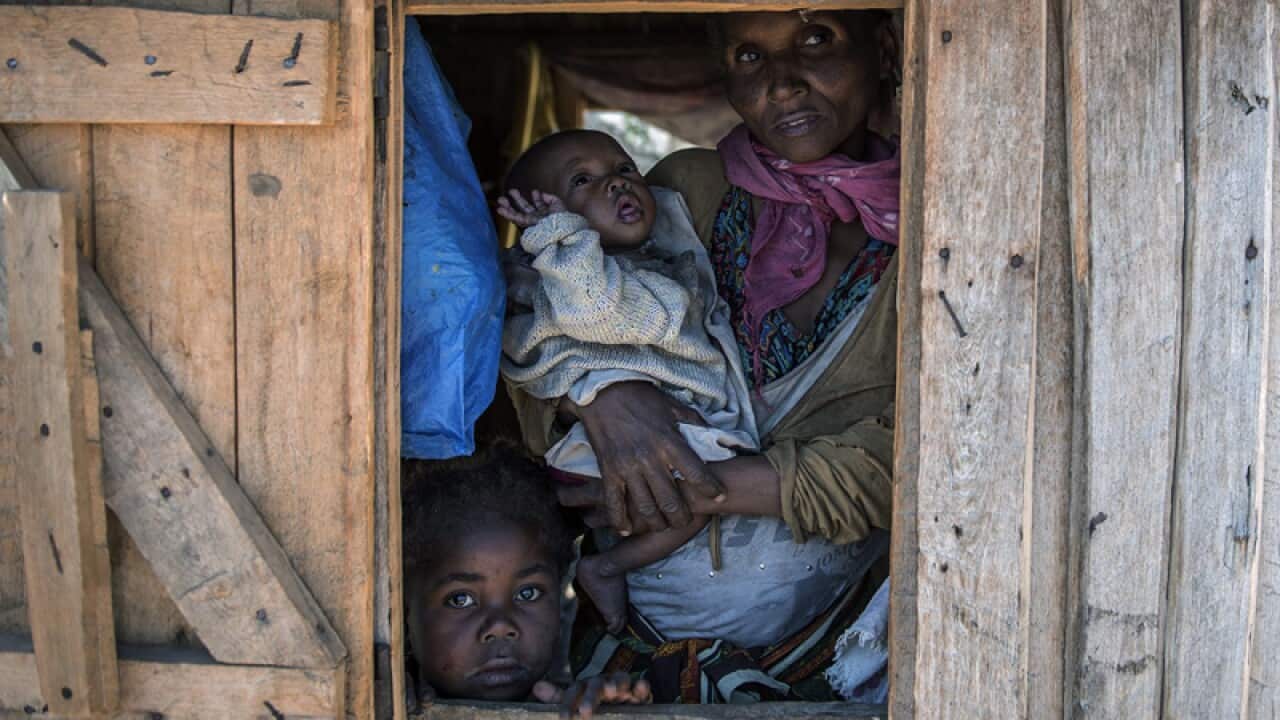 Mother of two, Sija Marcelline, in her house in Madagascar