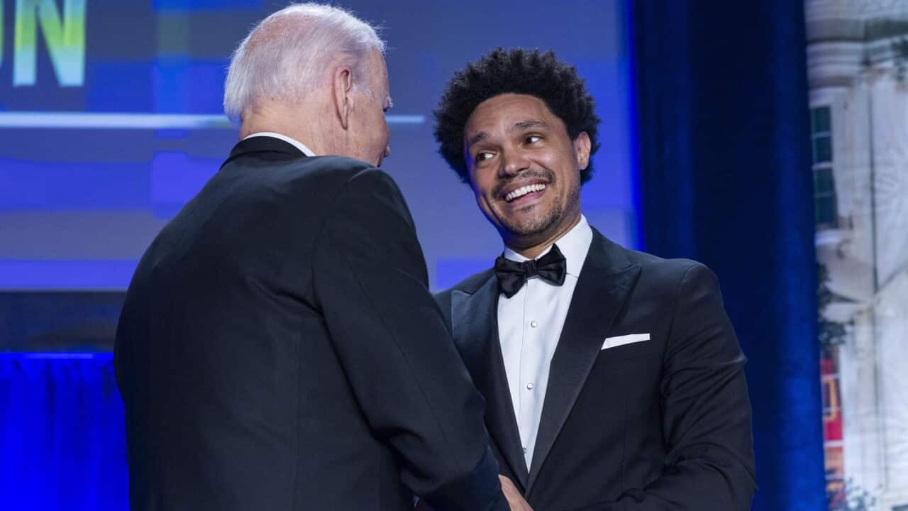 US President Joe Biden shakes hands with ‘Daily Show’ host Trevor Noah at the White House Correspondents' dinner