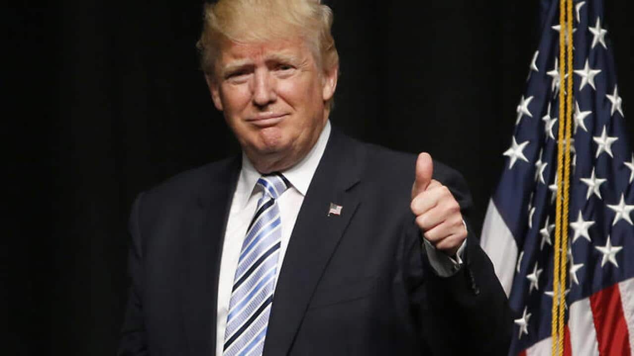 Republican presidential candidate Donald Trump acknowledges the crowd after giving an energy speech at the Williston Basin Petroleum Conference, Thursday, May 26, 2016, in Bismarck, N.D. (AP Photo/Charles Rex Arbogast)