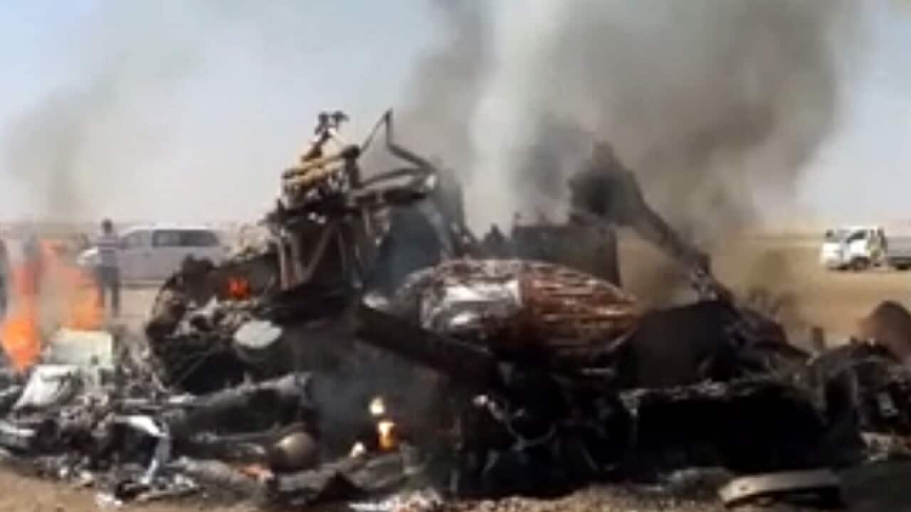 An image from video of the wreckage of a Russian military helicopter