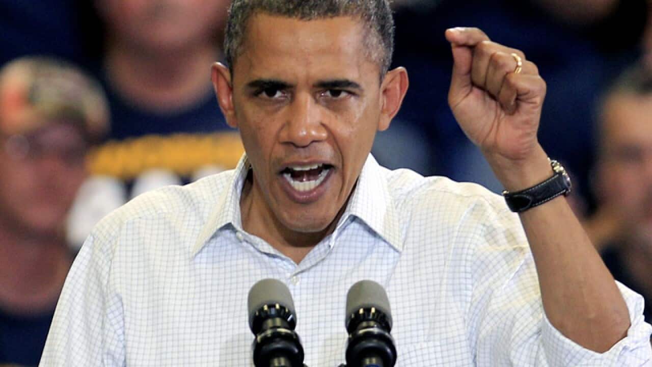 Obama tells Americans to punt Romney plan