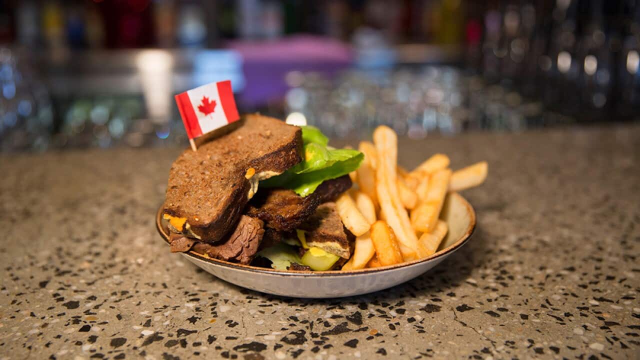Montreal meat brisket Sandwich served with chips