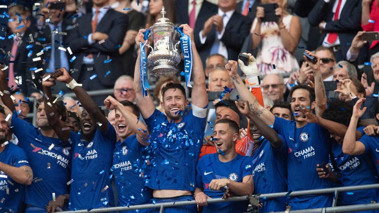 Chelsea lifts the trophy after winning the FA Cup final match against Manchester United at Wembley stadium, London, Britain, 19 May 2018.