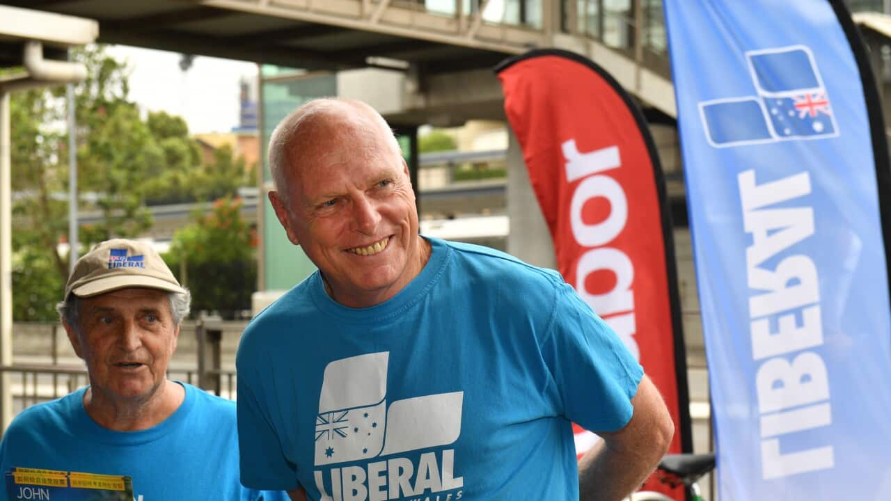 Jim Molan wearing a blue t-shirt and smiling