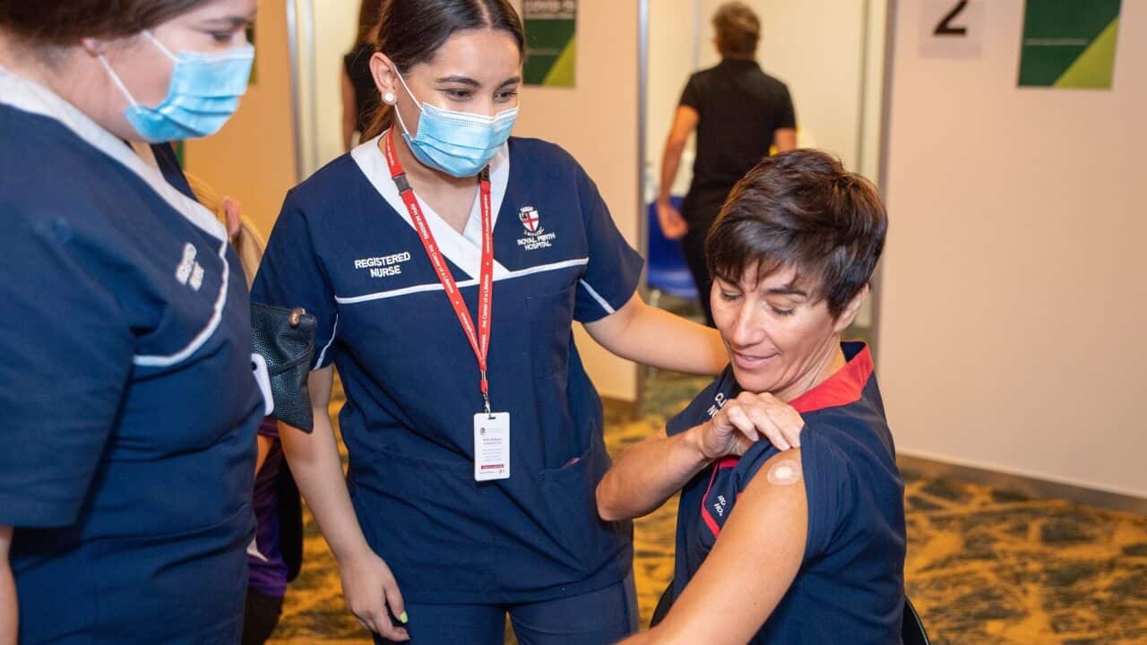 Nurse Antonia Garza has just received the Pfizer coronavirus vaccine in Perth