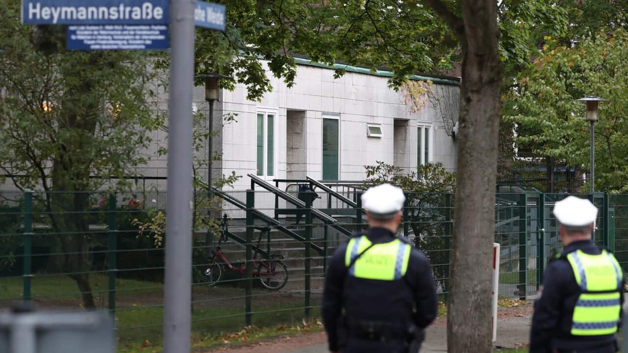 Police officers in front of the synagogue Eimsbuettel in Hamburg, Germany.