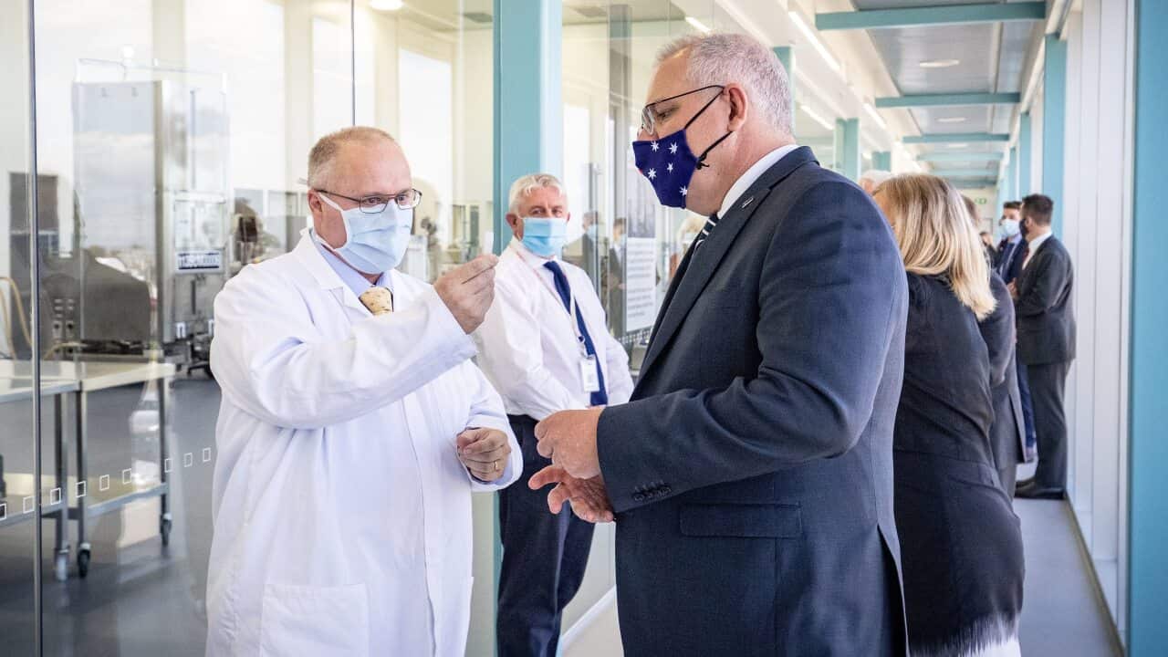Prime Minister Scott Morrison is shown the CSL Lab where a COVID-19 vaccine is being produced in Melbourne.