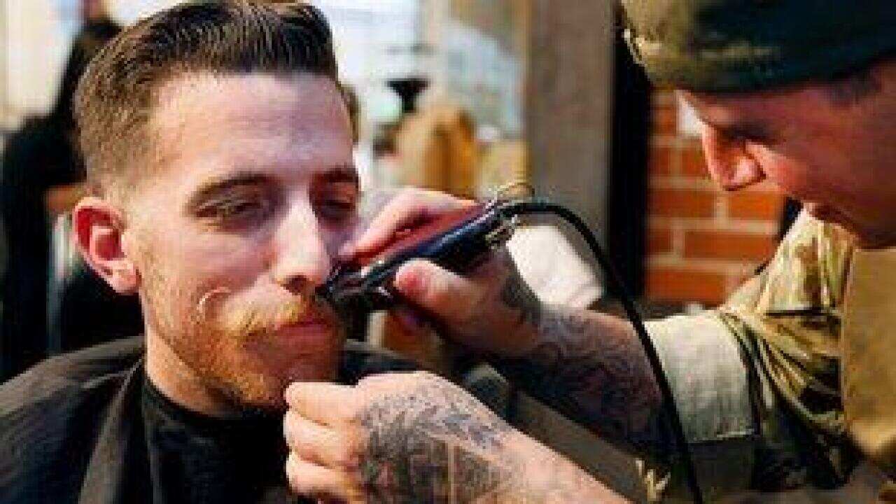 Men growing moustaches for Movember