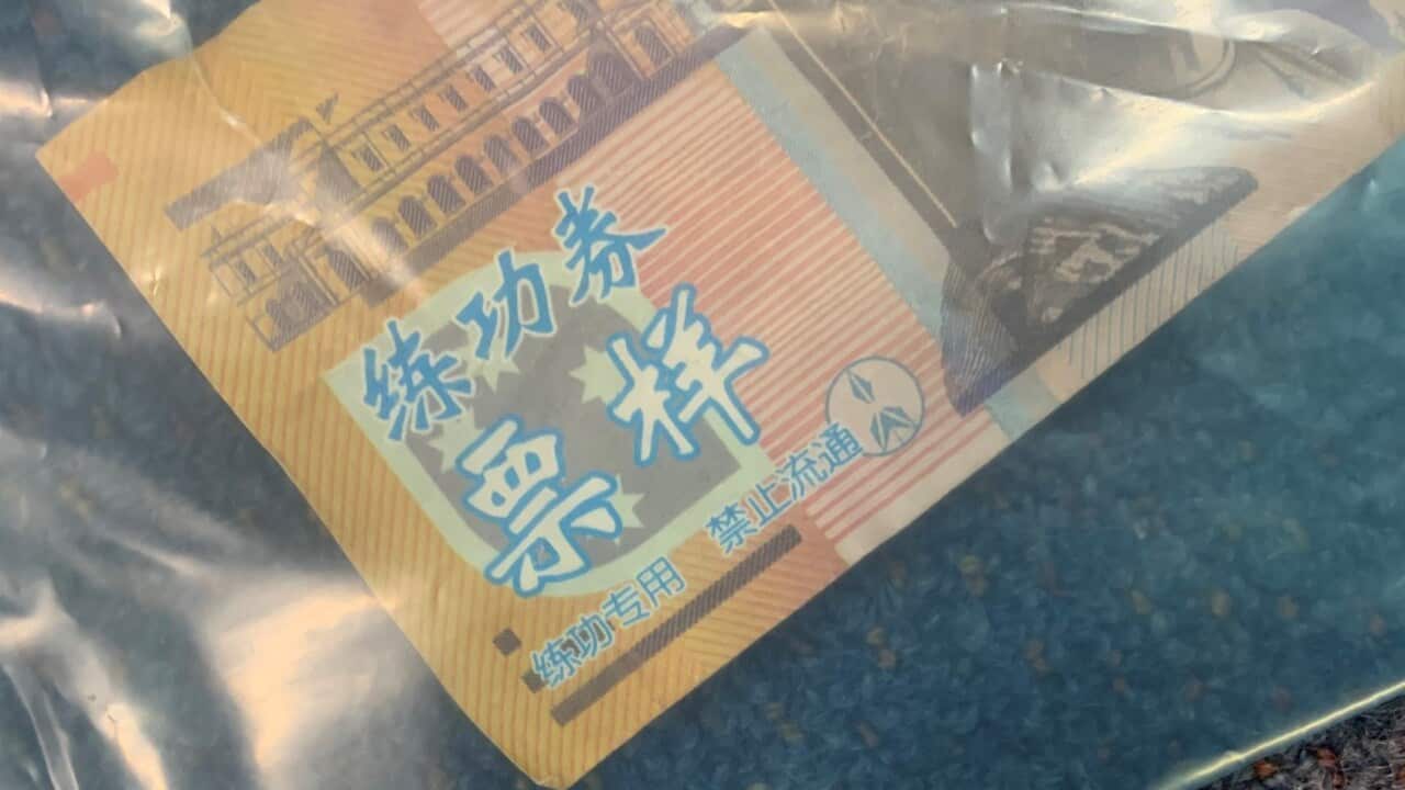 Counterfeit $50 printed with Chinese characters notes