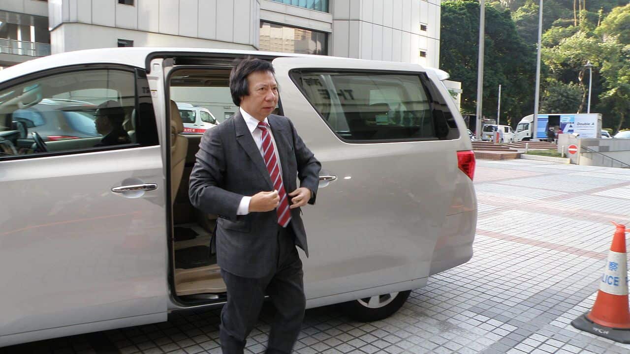 The two billionaire brothers, Thomas and Raymond Kwok