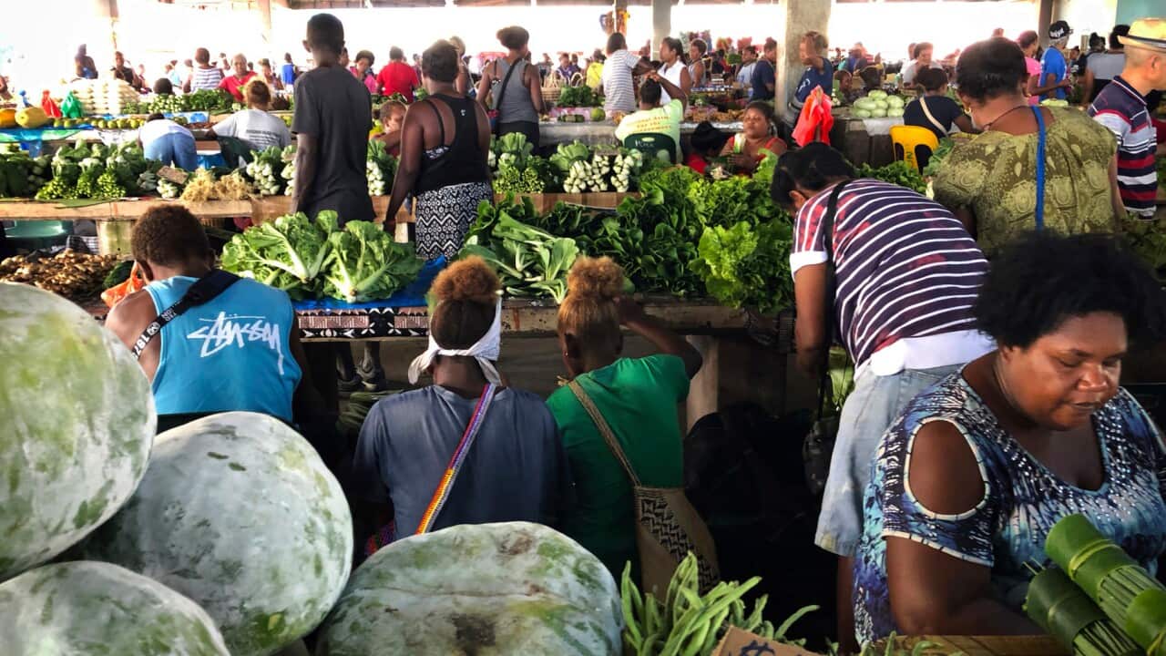 Market customers in the Solomon Islands capital