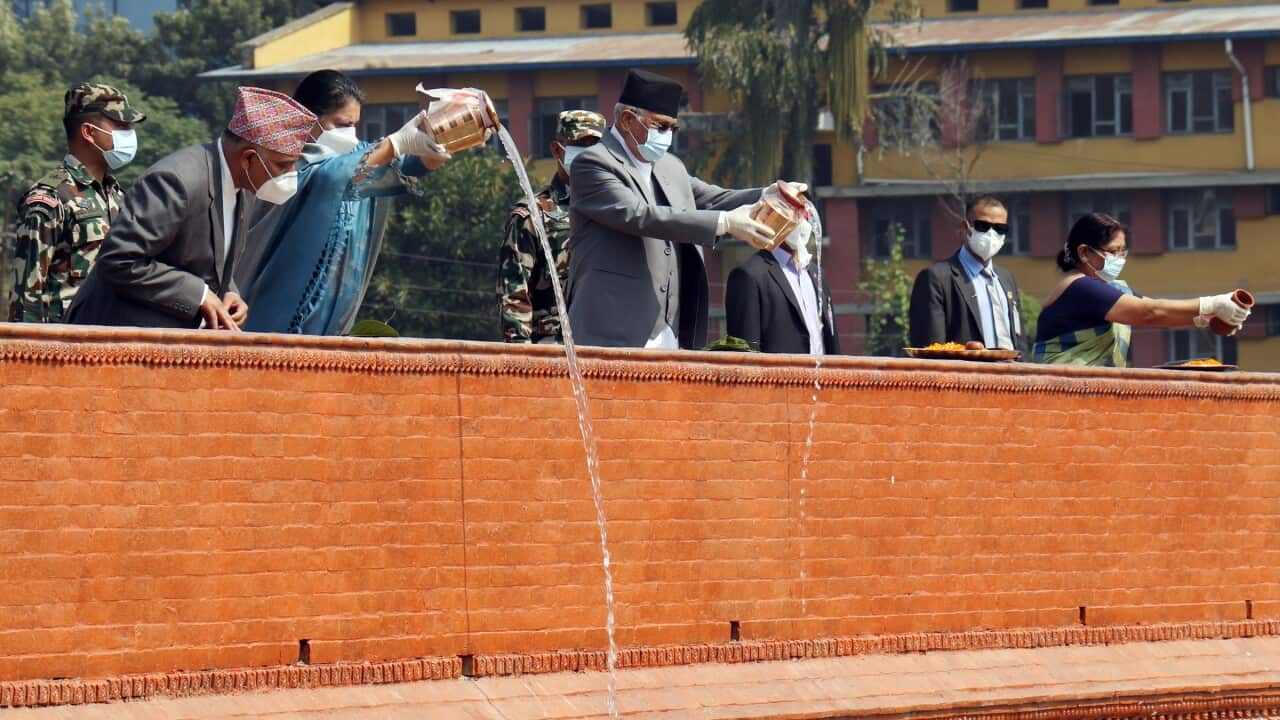 Nepal's President Bidya Bhandari and Prime Minister KP Sharma Oli pouring holy water into the newly renovated Rani Pokhari in Kathmandu.