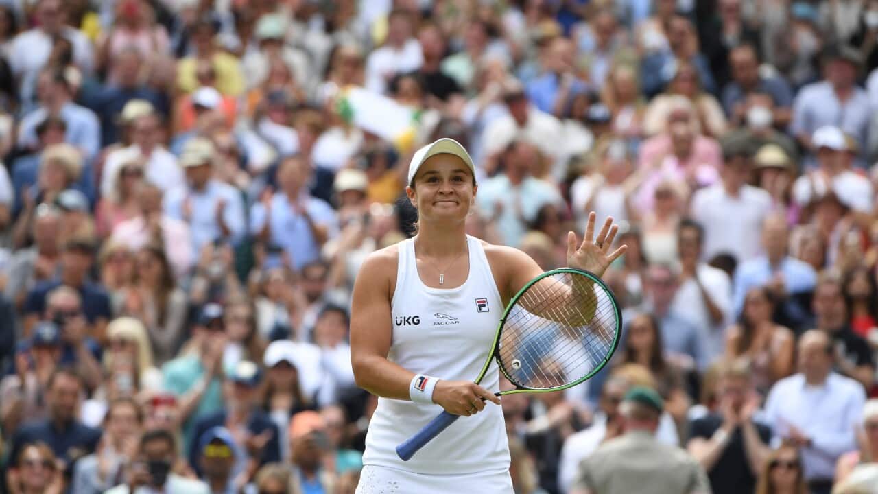 Ash Barty celebrates winning against Angelique Kerber during their women's semi final match at Wimbledon