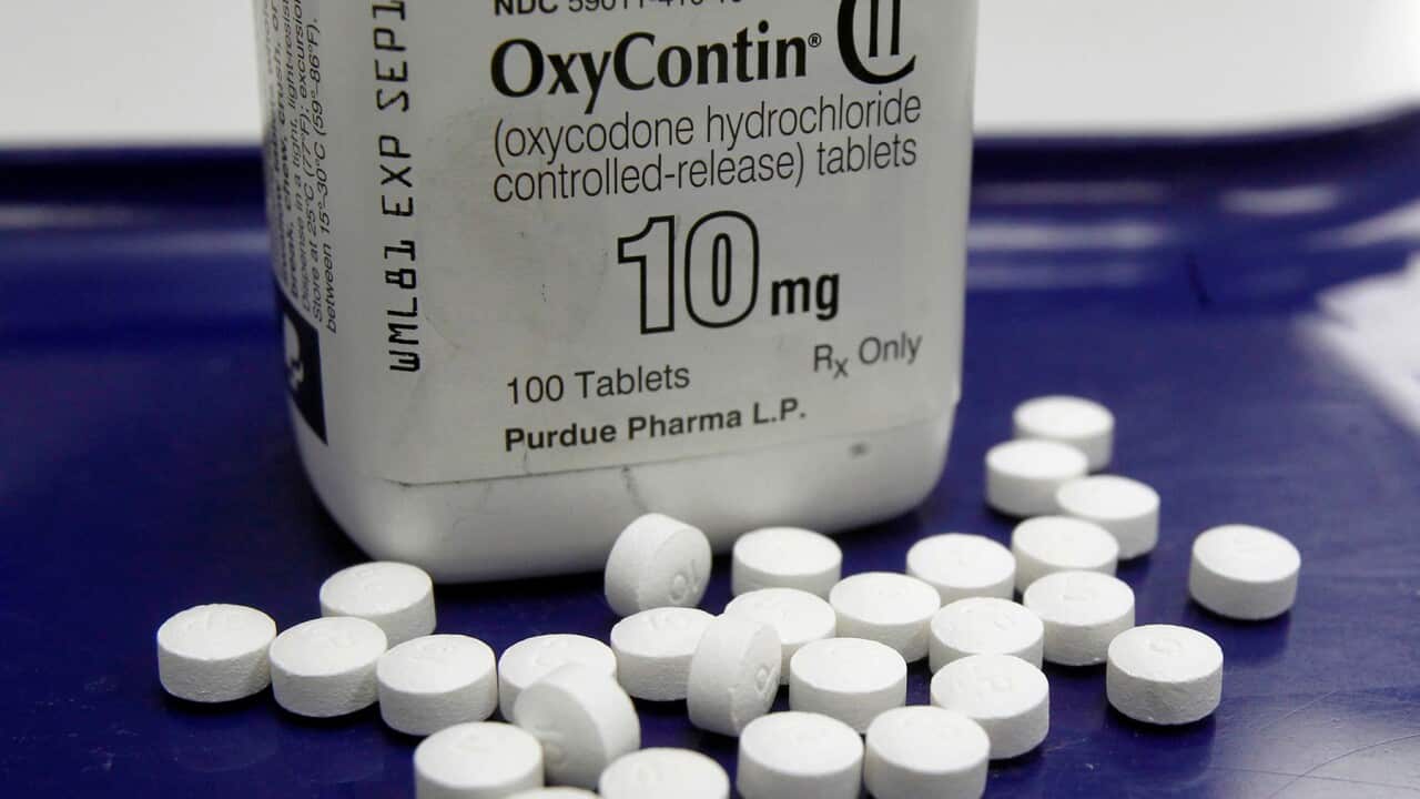 OxyContin (Oxycodone) pills and container