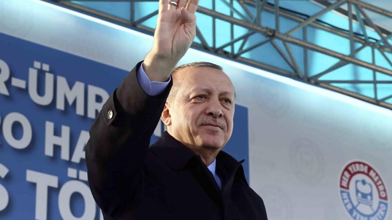 Turkey's President Recep Tayyip Erdogan waves to supporters during a rally in Istanbul, Friday, 15 December, 2017.