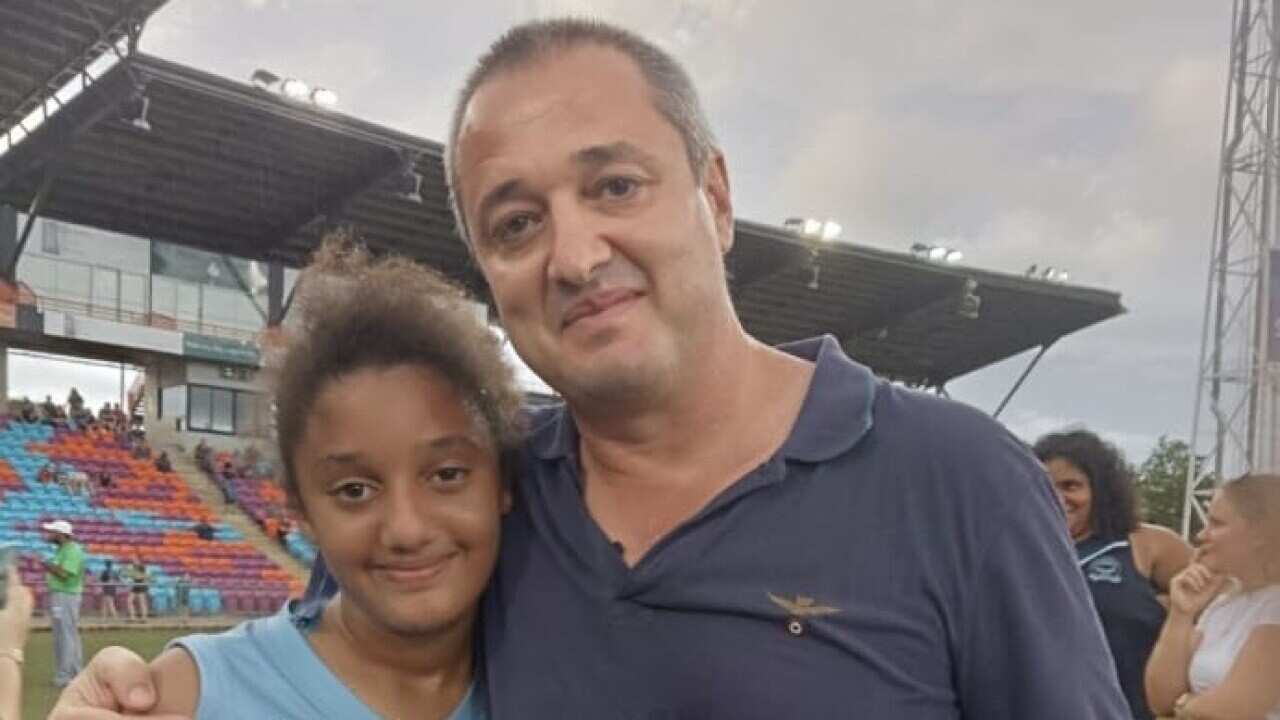 Marco con la figlia Rosetta dopo la vittoria al campionato NTFL under 12.jpg