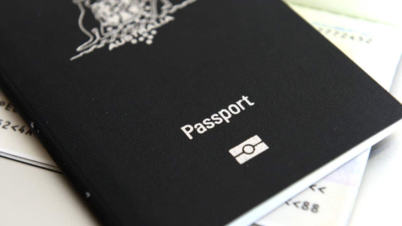 An Australian passport pictured in Brisbane, Thursday, July 25, 2013. (AAP Image/Dan Peled) NO ARCHIVING