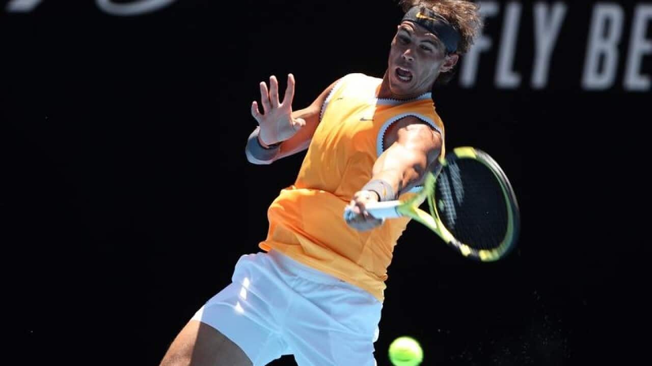 Rafael Nadal of Spain in action against James Duckworth.