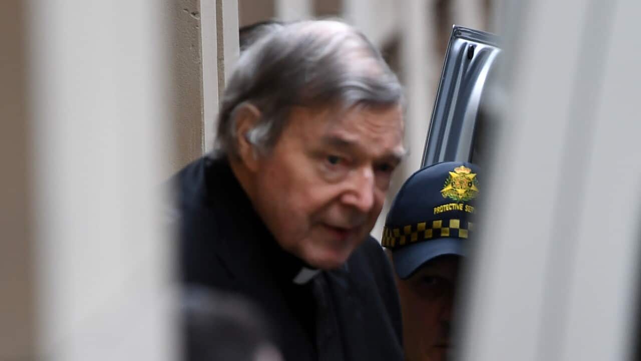 Cardinal George Pell leaves the Supreme Court in Melbourne following his conviction.
