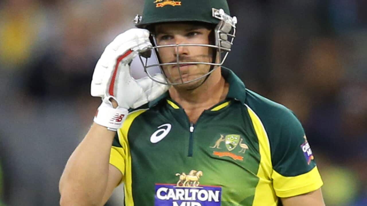 Aaron Finch leaves the field for Australia