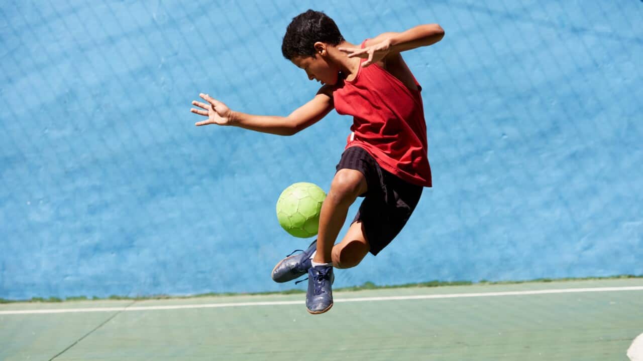A boy playing football