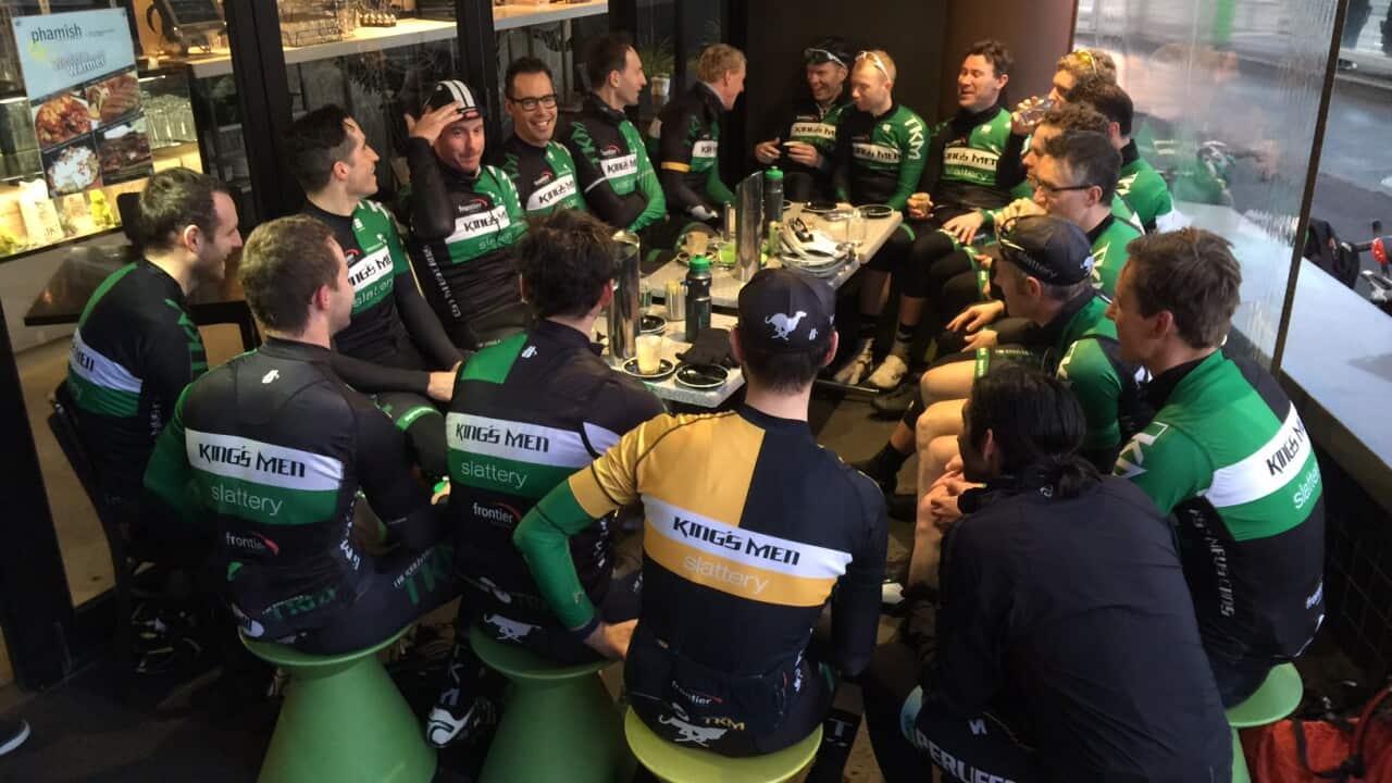 The King's Men cycling group chat over coffee (SBS).