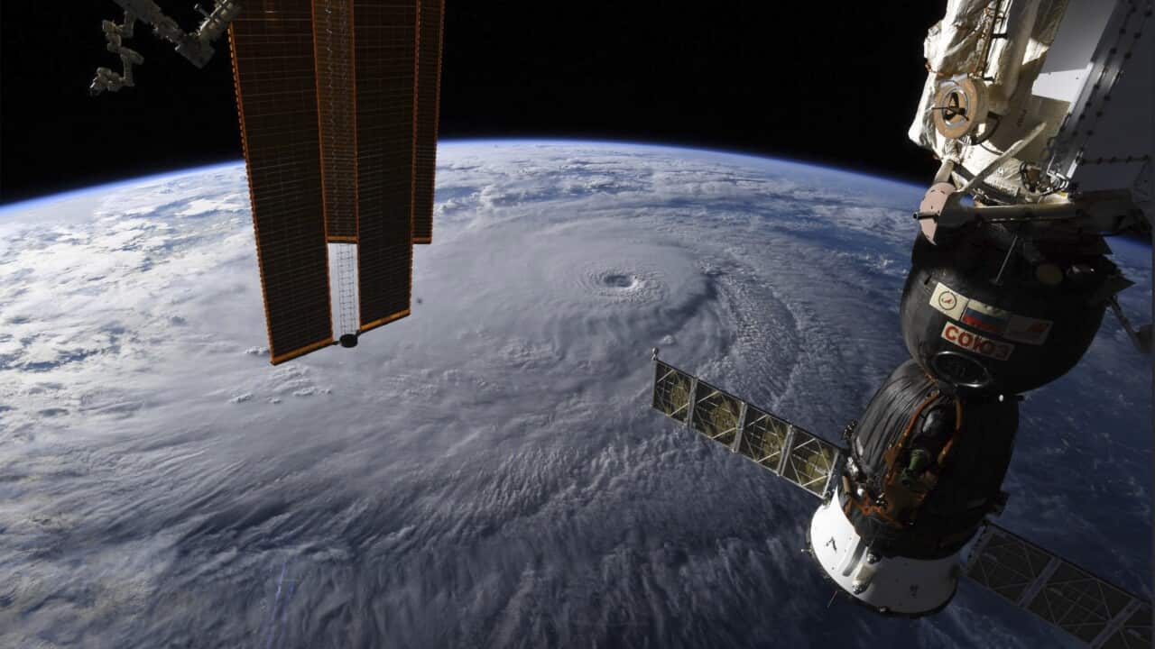 This image provided by NASA on Wednesday, Aug. 22, 2018 shows Hurricane Lane as seen from the International Space Station.