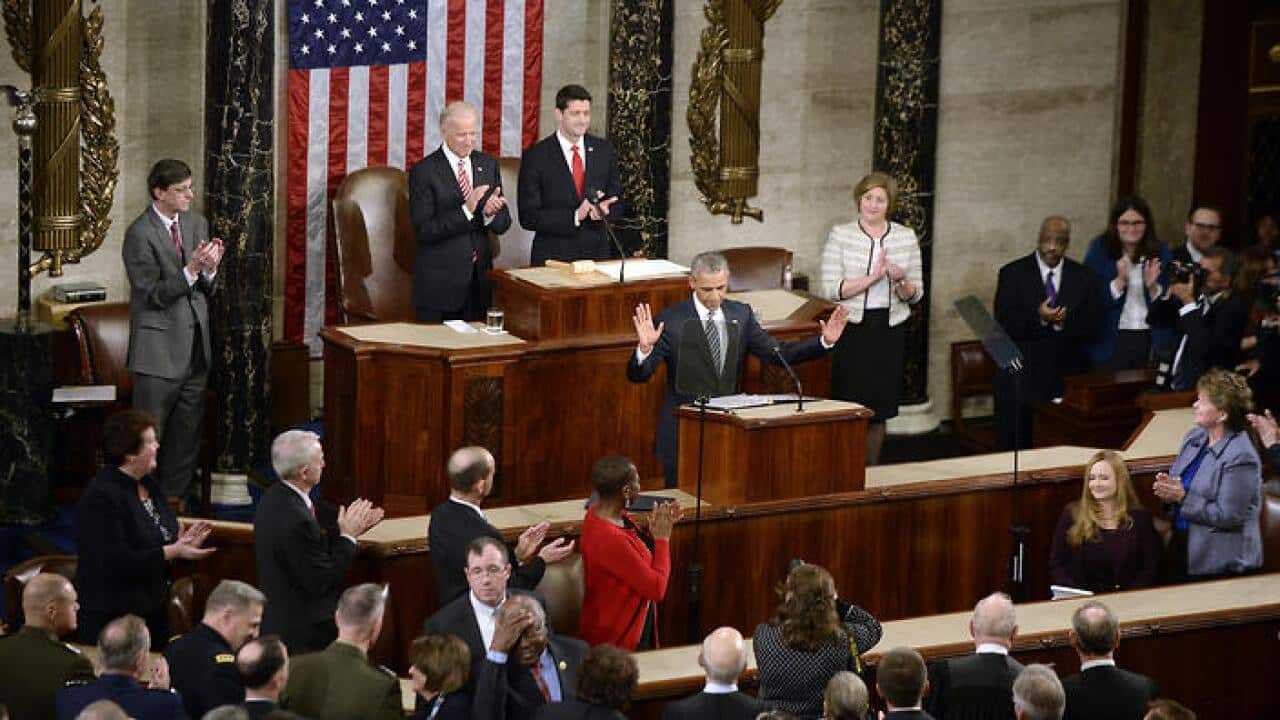 US President Barack Obama waves to the House Chamber before he delivers his final State of the Union address to a joint session of Congress at the Capitol in Washington, DC, USA, on Tuesday, January 12, 2016. (AAP)