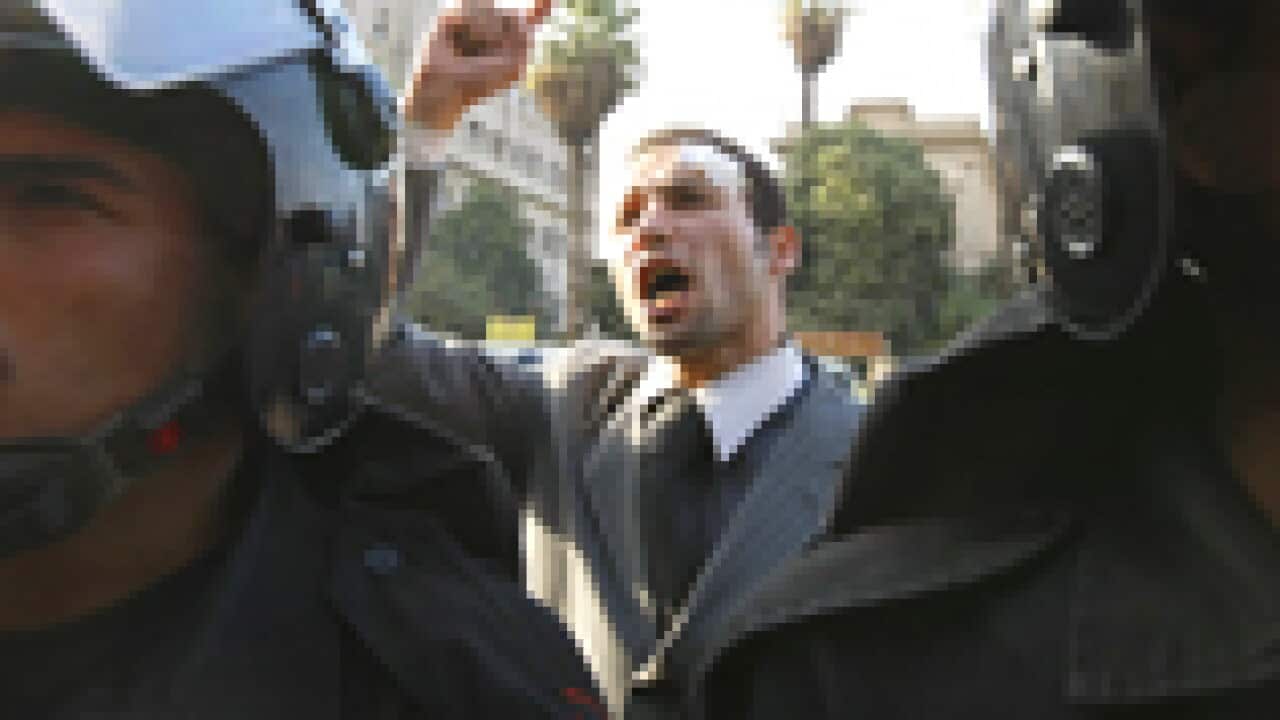 egypt_suit_protest_110128_S_getty_1120523517