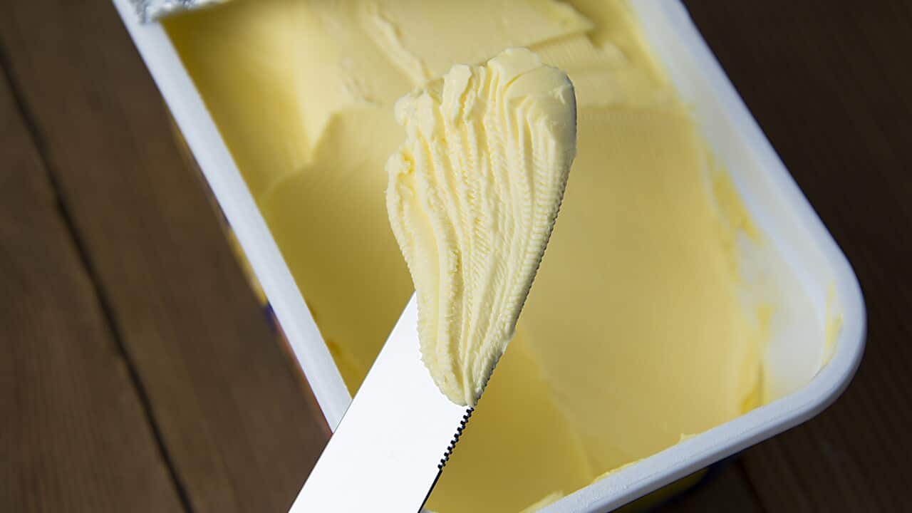 Margarine spread onto a knife