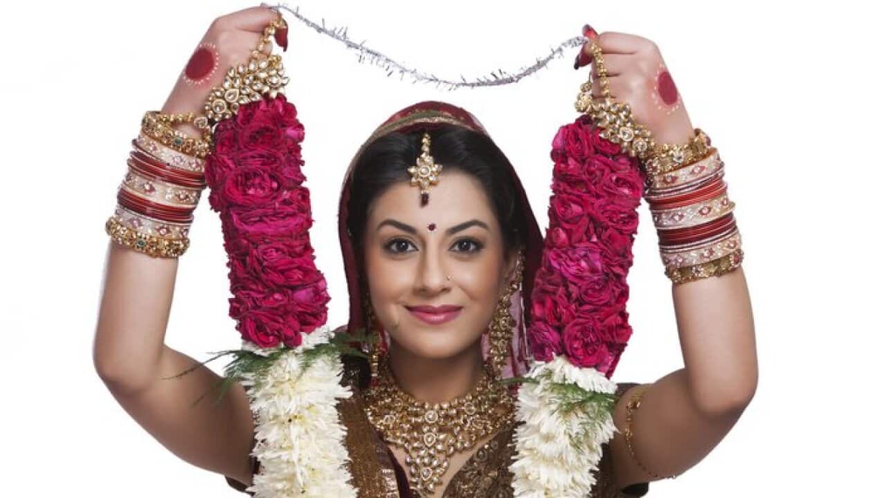 Bride holding a garland for marriage